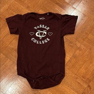 Vassar College Baby Bodysuit in Maroon